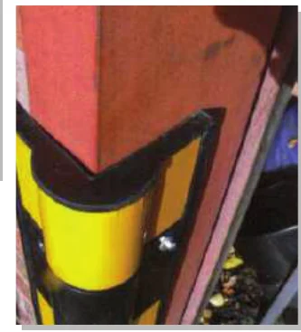 Rubber corner guard fitted to a pillar
