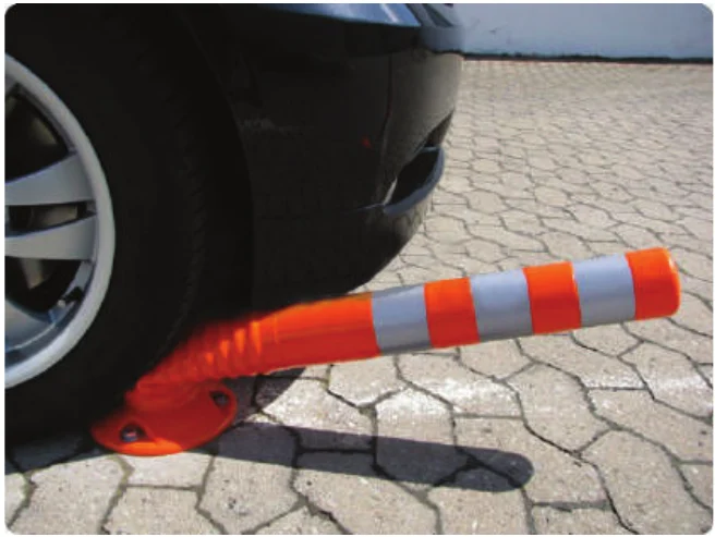 Flexible spring post bending under a vehicle wheel
